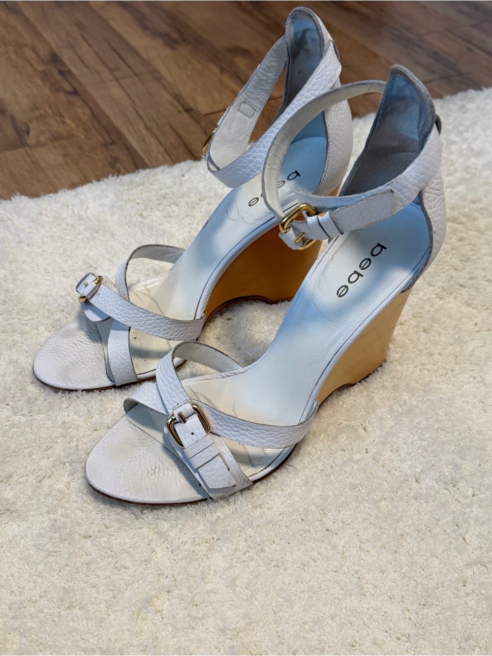 bebe White Wedge Sandals with Gold Buckles